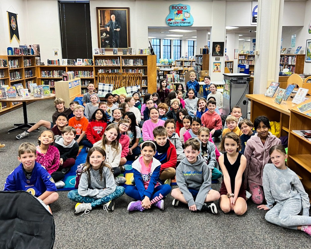 Third graders gathered in their school library during Read to the Final Four in San Antonio